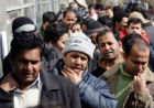 Immigrati in fila